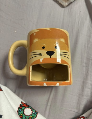 Leo the lion mug with - with, cookie